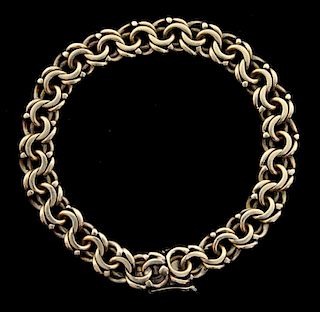 Fancy link yellow gold bracelet. Tested as 15ct