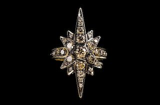 Diamond star ring, set with tinted colour diamonds in an oxidised setting mounted in 18 ct gold.