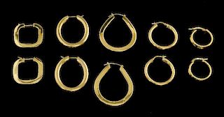 Five pairs of hoop earrings, two  stamped 18 ct, another 9 ct, two unmarked