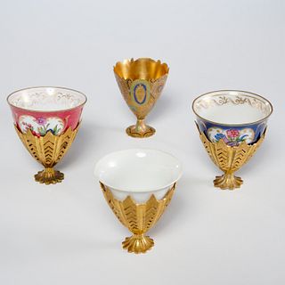 (4) Silver gilt, porcelain Zarf cups, incl. enamel