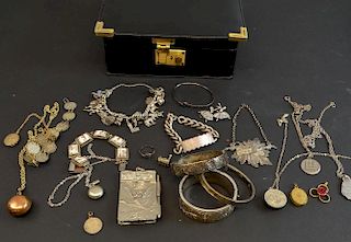 Collection of mainly silver jewellery including engraved bangles, cameo bracelet, charm bracelet, yellow metal lockets,  and 