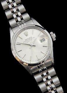 Ladies Rolex Date Oyster Perpetual watch, stainless steel case and bracelet. silver colour dial with date aperture at 3, on a