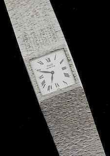 Piaget 18ct white gold bracelet watch, on a textured integral bracelet, quartz movement,