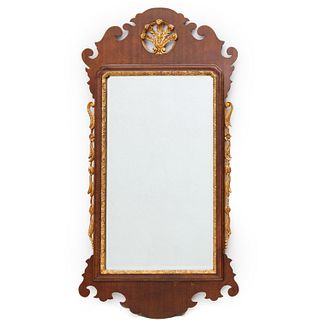 Chippendale style carved and parcel gilt mirror