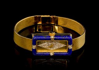 Diamond, lapis and gold watch by Kutchinsky,  the rectangular dial with forty six pave set diamonds in a marquise shape, with