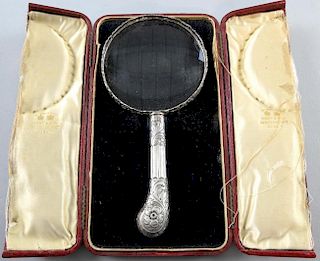 Victorian silver mounted hand-held magnifying glass with pierced scrolling foliate decoration, by Rosenthal, Jacob & Co., Lon