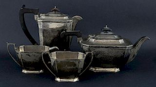 George VI silver four piece tea service, comprising teapot, hotwater jug, sugar bowl and cream jug by Harrison Brothers & How