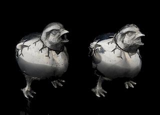 Pair of modern silver novelty salt and pepper shakers in the form of chicks breaking out of their shells, by Garrard & Co. Lt