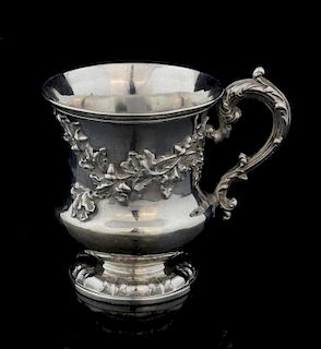 William IV silver mug of baluster form with applied oak leaf decoration on round foot, by Edward, Edward Junior, John & Willi