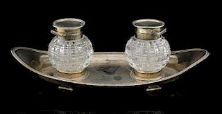 Victorian silver oval desk stand with two silver mounted cut glass inkwells, reeded border on four shaped feet, by John Grins