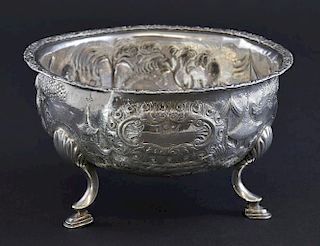 George II Irish silver sugar bowl embossed with figures in a landscape, on three hoof feet, by Matthew West, Dublin, 1740, 7.