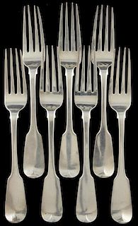 Seven George IV Irish silver fiddle pattern dinner forks, four by Samuel Neville, Dublin, 1820, three by Thomas Farnett, Dubl