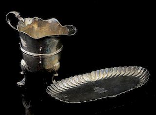 19th century Irish silver oval snuffer tray with lobed rim, maker's mark rubbed, and an Irish silver cream jug with 'S' scrol