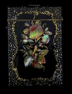 Papier Mch card case decorated in gilt and with mother of pearl flowers. 11 x 7.5 cm