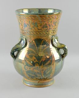 Pilkingtons lustre a large three-handled  vase by William S. Mycock with Persian style formal decoration of  flowers in green