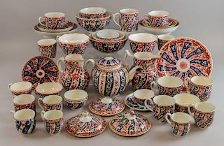 19th century tea china with spiral blue gilt and iron red decoration, various factories, including jugs, bowls and saucers et