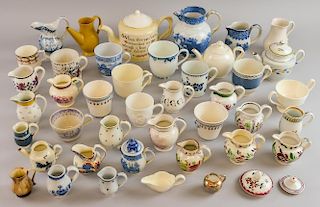 Collection of 19th century English pottery including cups and miniature jugs, approx 47 pieces