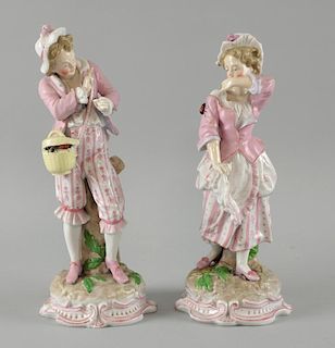 Pair of Continental figures of a young man and woman with ladybirds. 27 cm high