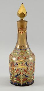 Continental amber glass decanter with polychrome enamel decoration. 32.5cm and a green glass ships decanter with etched gilt 
