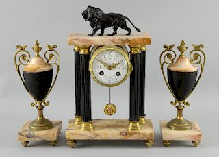 Early 20th century pink marble and spelter clock garniture,  clock with twin train movement striking on bell, 36cm flanked tw