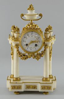 French white marble and gilt metal portico clock surmounted by an urn, with eight day striking movement