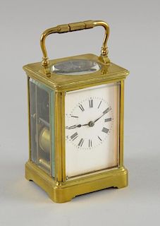 French brass carriage clock striking the hours and half hours on a gong 18cm