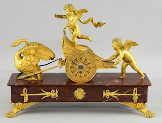 Regency ormolu and rouge marble clock, attributed to Thomas Weeks, clock dial is a chariot wheel, itself a representation of 