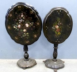 Two Victorian black lacquered papier mache and wood tables with oval shaped tops and mother of pearl and floral painted decor