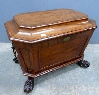 Mid19th Century mahogany cellaret with a fitted lead lined interior, brass lion side handles on paw feet supports. 45cm high