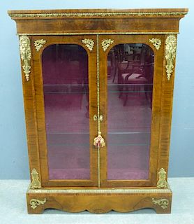 19th Century style walnut pier cabinet with gilt metal mounts, 144cm x 107cm,