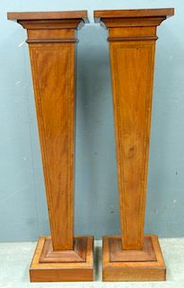 Pair of early 20th century mahogany and crossbanded square pedestals, 122cm high,
