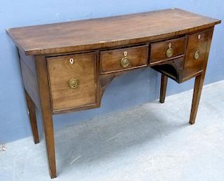 19th century mahogany bow fronted sideboard with two central  drawers flanked by a deep drawer and a cupboard door on square 