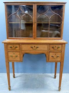 19th century mahogany cabinet on stand, the top with two glazed doors the base with five drawers  on square tapering legs,  1