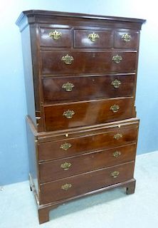 19th century mahogany chest on chest, upper section with three small top drawers over three long drawers, brushing slide over