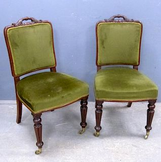 Set of six 19th century mahogany framed dining chairs with padded seats and backs on turned and carved supports,