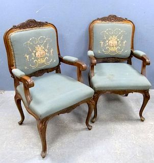 Pair of 19th century style beech framed open armchairs with padded seats and embroidered tapestry backs,