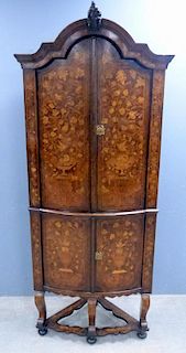 18th century Dutch floral marquetry inlaid free standing corner cabinet of four drawers raised of scrolled legs united by an 