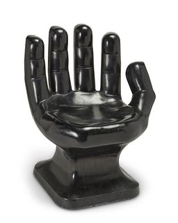 A contemporary postmodern molded plastic "hand" chair Late 20th century 34"H x 28" W x 20" D