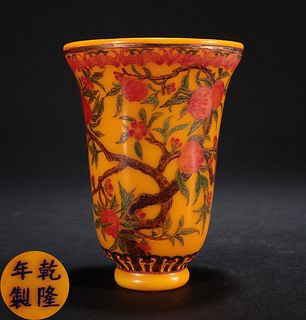 YELLOW GLASS CARVED FLOWER PATTERN CUP