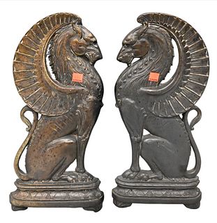 A Pair of Bronze Art Deco Griffin Form Andirons