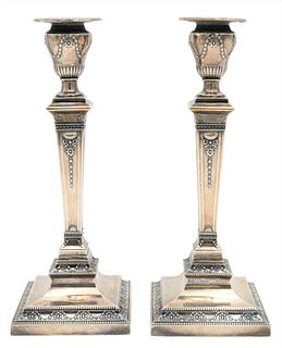 A Pair of Sterling Silver Weighted Candlesticks