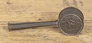 Early American embossed tin baby rattle/whistle, 19th c., with an image of an eagle