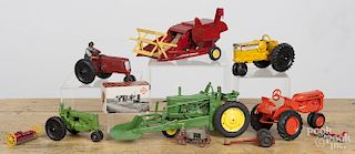Farm tractors and related toys, to include a Reuhl clipper combine, a Frank Bartlow plow