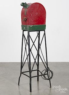 Steel and iron Mutoscope coin operated arcade machine, early 20th c., on an iron stand, 53'' h.
