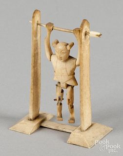Carved bone animated acrobat toy, ca. 1900, 3 1/2'' h.