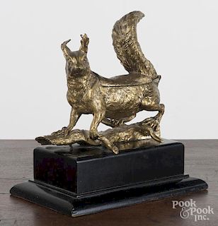 Cast brass figural inkwell of an Aberts squirrel, 20th c., 10'' h., 9'' w.
