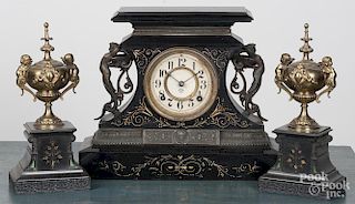 Ansonia slate mantel clock, ca. 1900, with associated urn garnitures, 12 1/2'' h.