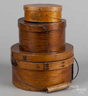 Three bentwood pantry boxes, 19th c., largest with handle - 5 1/2'' h., 9 1/4'' dia.