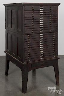 Mahogany map cabinet, ca. 1900, with paneled ends and twenty-four drawers, 52 1/2'' h., 26'' w.