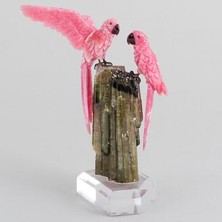 Carved Rose Quartz Parrots with Cabochon Eyes, Agate Beaks, and Silverplate Legs Mounted on Smoky Quartz Piler on Lucite Base